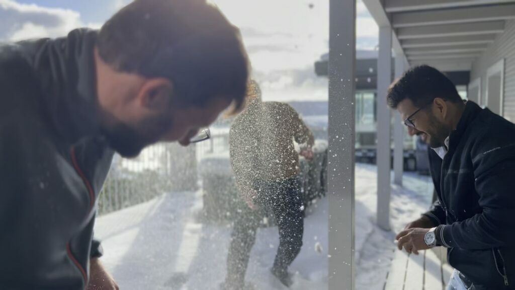 wetransform offsite picture depicting snowball fight between CEO, Marketing Manager, and Java Engineer