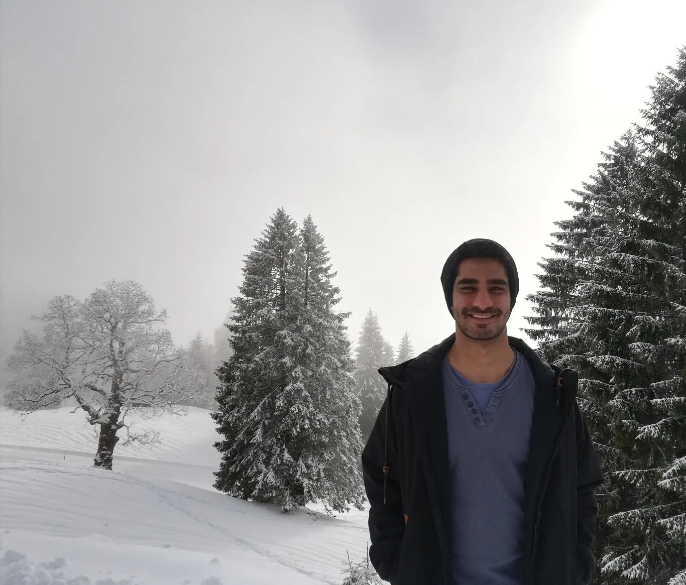 wetransform marketing manager Akshat Bajaj in a snowy Austrian landscape