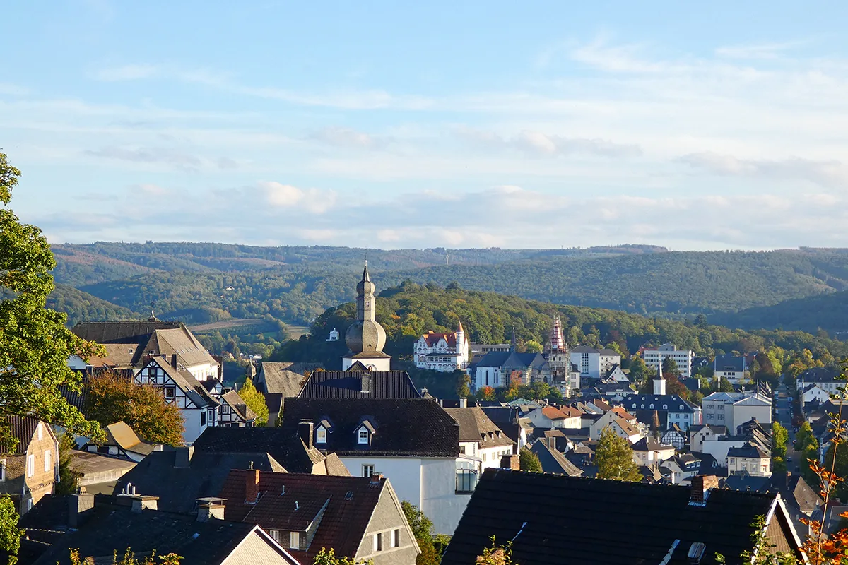 View of Arnsberg, a picturesque town with chiefly white buildings, nestled in the woods of the Hochsauerland county, in the German state of North Rhine-Westphalia
